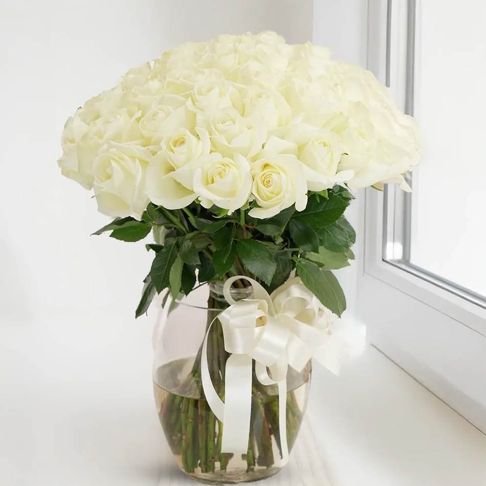 Splash Of White Roses in Glass Vase